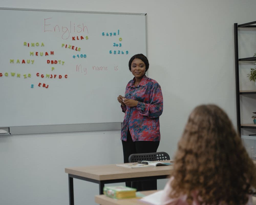 A teacher leading a friendly language class